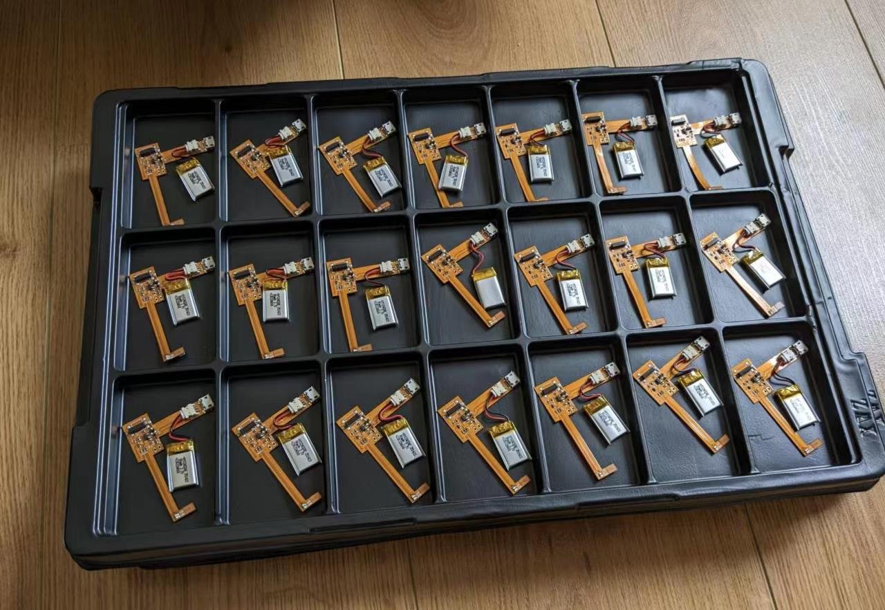 PCB assemblies arranged in compartment trays