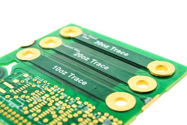 Circuit-board sample with several wide copper paths and printed trace labels