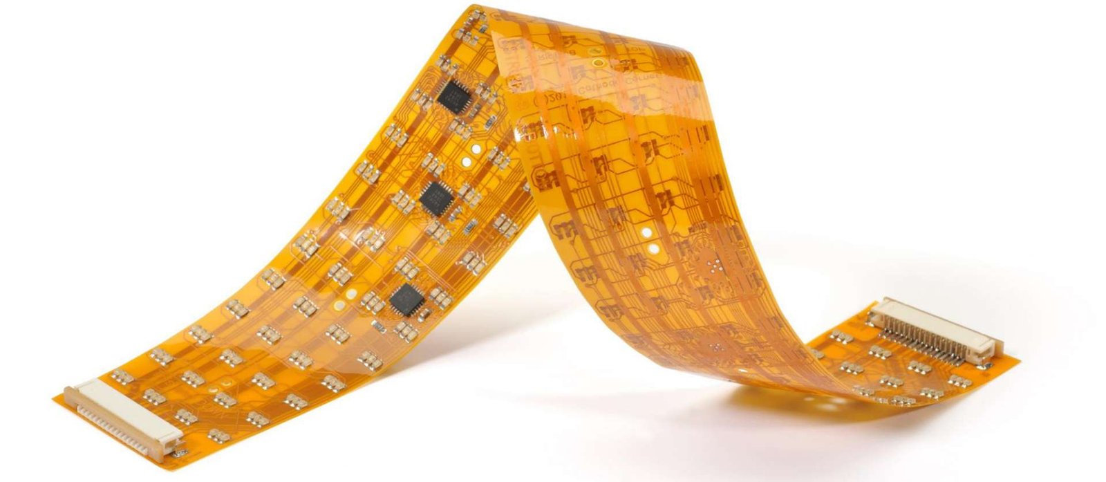 Bent flexible circuit | GlobalWellPCB Amber flexible circuit folded into a bend with visible traces and components