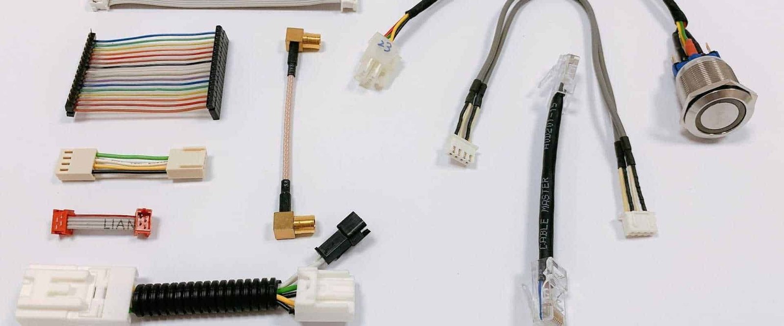 Assorted cable and wire-harness samples with connectors and terminals