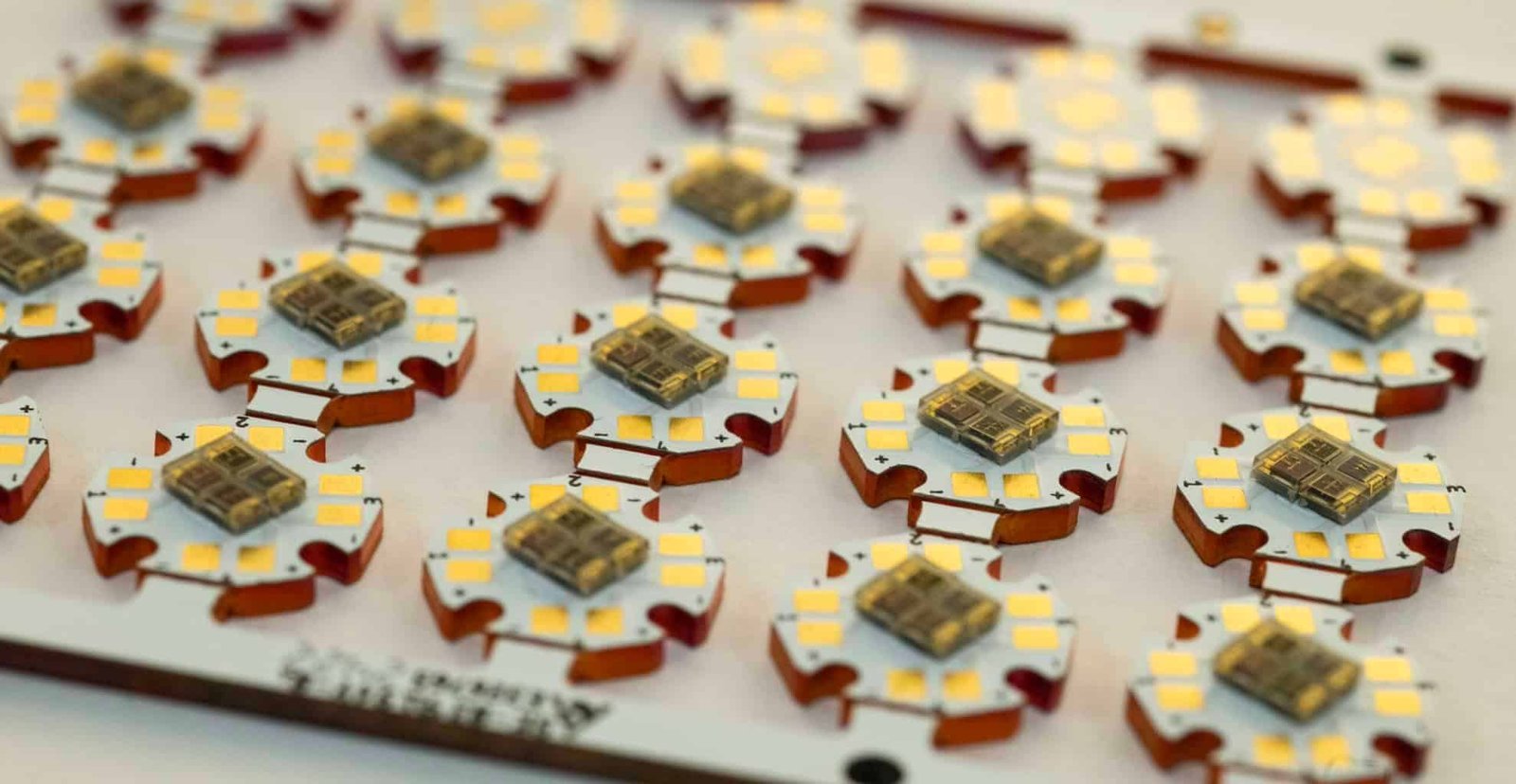 Array of small star-shaped circuit boards with mounted LED packages