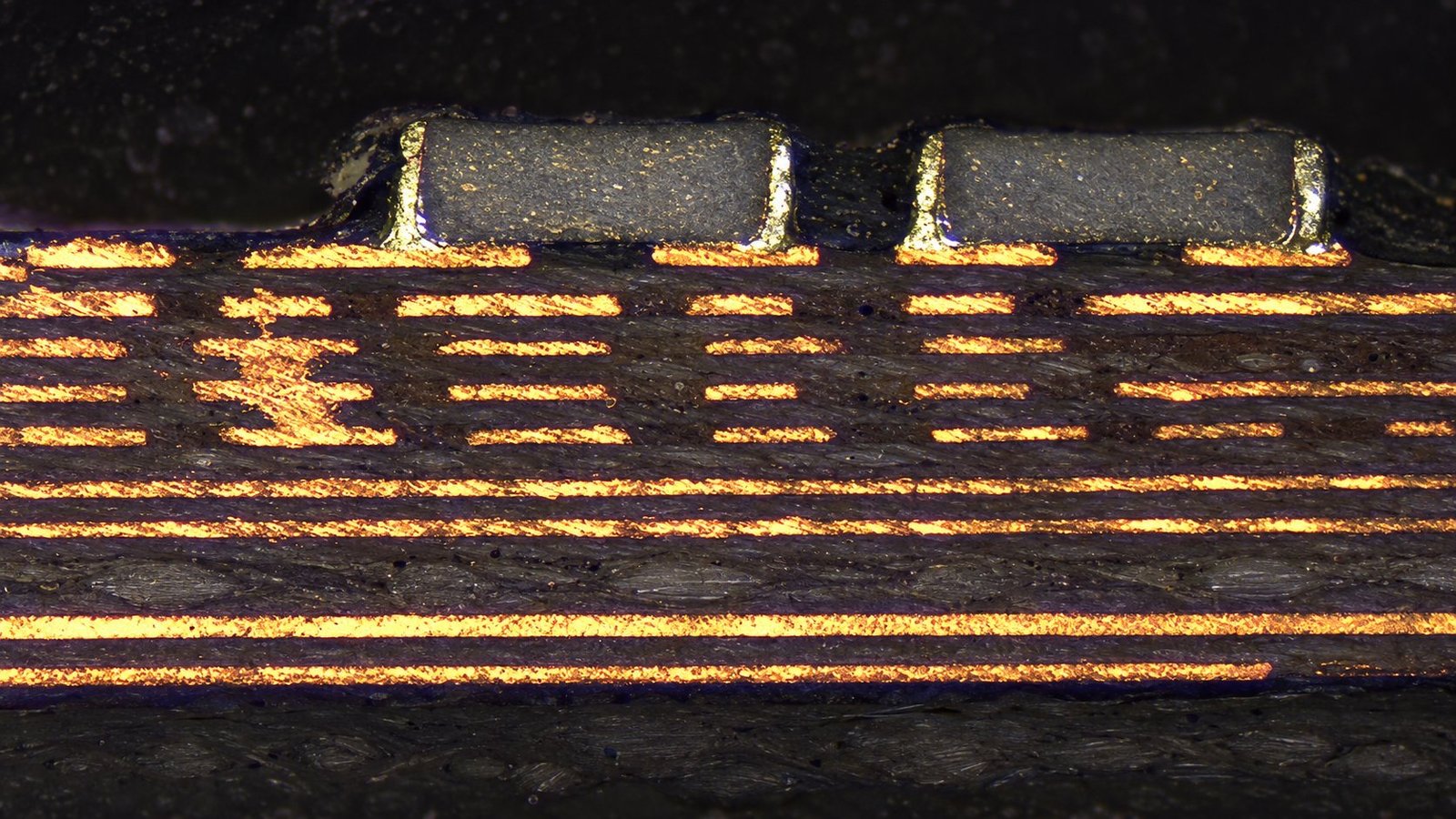 PCB Cross-section Inspection | GlobalWellPCB PCB cross-section showing copper layers and plated hole walls